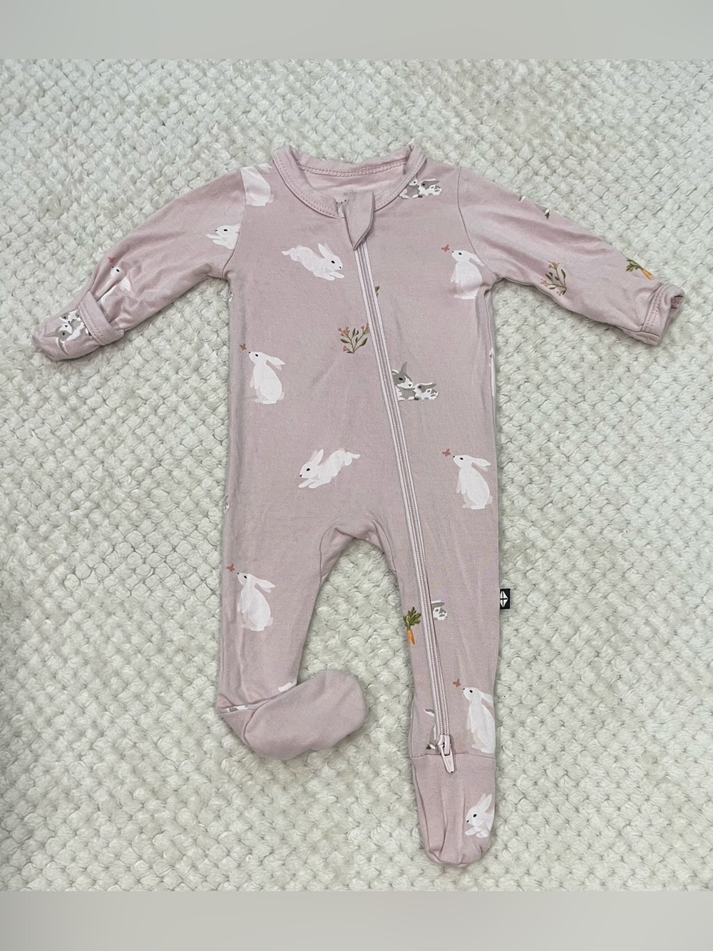 Kyte Baby Zippered Footie in the "Blush Rabbit" Print Size Preemie